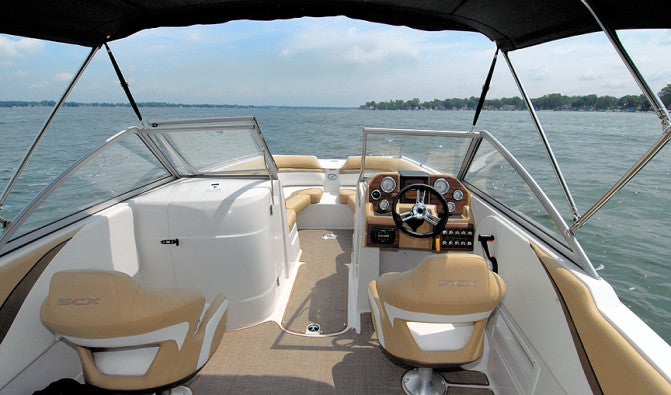 The spacious main cockpit sits behind a full walk-through windshield that provides great protection from cool air, greatly extending the boats usefulness early and late in the season.