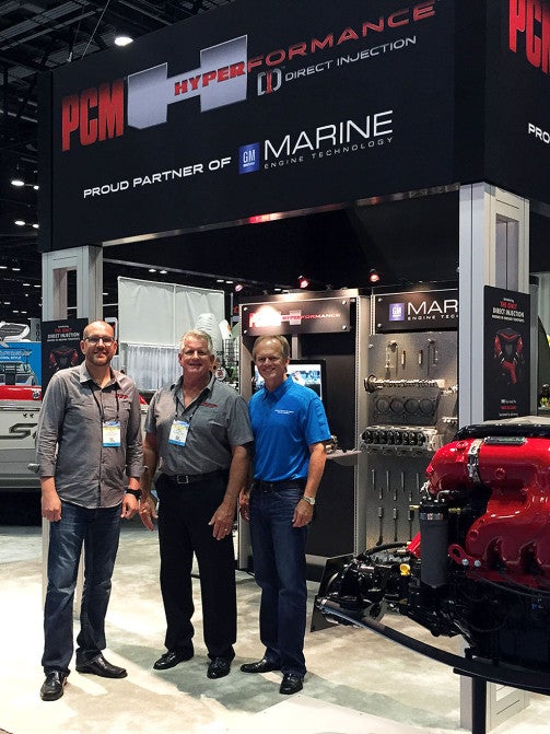 From left Trey Thurman, PCM Director of Operations, Mark McKinney, PCM Vice President of Operations and Bill Yeargin, Correct Craft CEO unveil the company’s new Hyperformance line at the 2015 Surf Expo trade show in Orlando, FL.