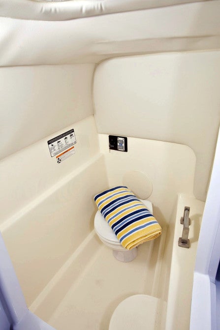 Thanks to the deep Catamaran hull, the head compartment is particularly spacious, with plenty of head room.