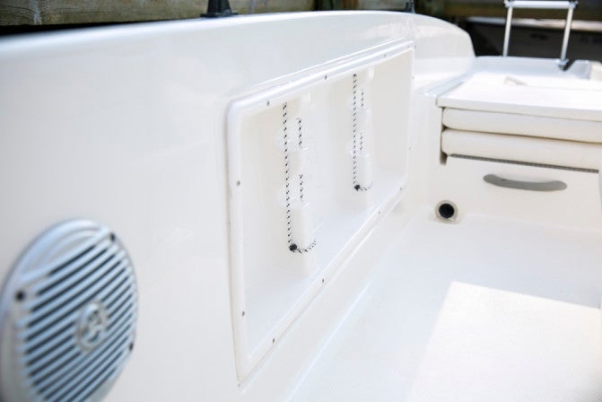 Rod storage racks integrated into both the starboard and port gunnels each accommodate four rods.